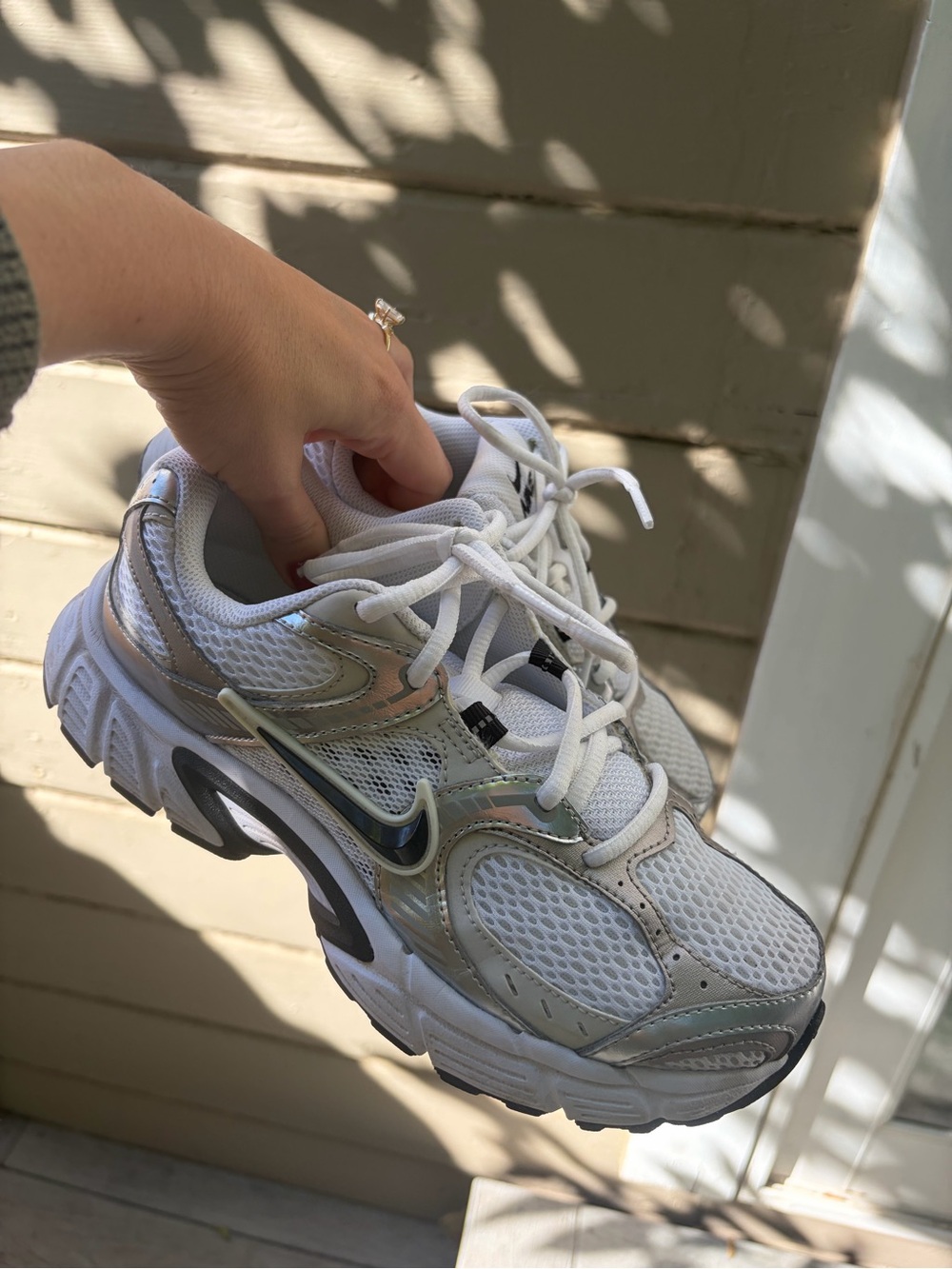 Nike Women’s White and Silver Mesh Running Sneakers